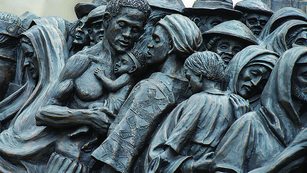 “Angels Unawares” sculpture commemorating migrants and refugees in St. Peter’s Square" by Catholic Church (England and Wales) is licensed under CC BY-NC-SA 2.0.