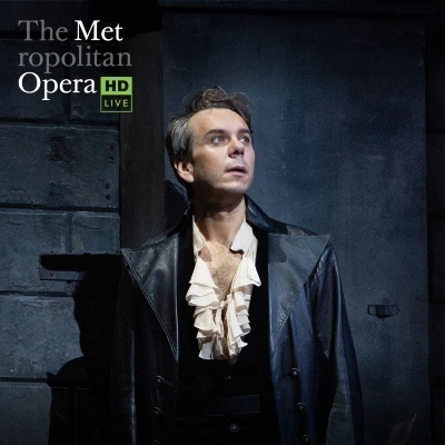 A man looking up to the right with "The Metropolitan Opera HD Live" logo