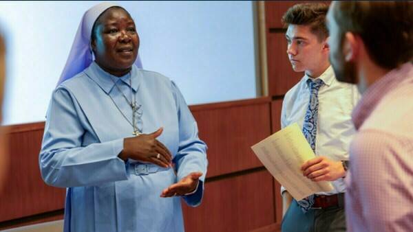 Sr. Draru talks to students