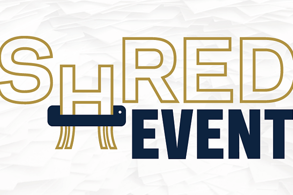 Shred Event graphic with the H in Shred being fed through a shredder.